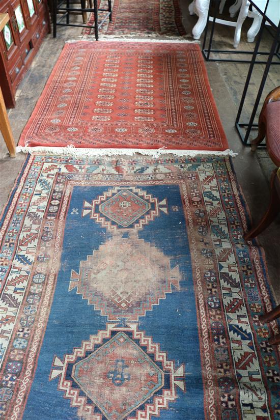 Bokhara rug and two other rugs